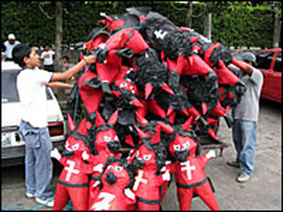 Vendors sell hundreds of thousands of devil pinatas in the days leading up to Dec. 7.