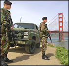 California National Guard members patrol at the south end of the Golden Gate bridge near San Francisco, March 19, 2003. Credit: Corbis