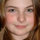 Macklin Levine, 12, loves the timeless lyrics of the Fab Four. They help her remember her father.