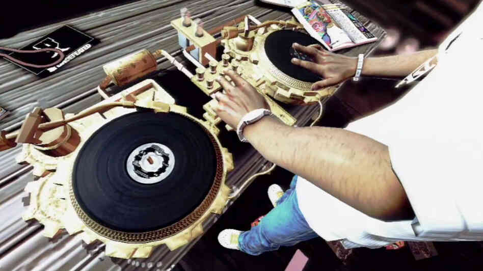W: A screenshot from 'DJ Hero' shows an avatar DJing. W: A screenshot from 'DJ Hero' shows an avatar DJing.