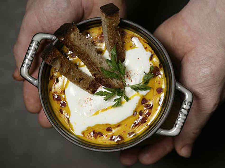 A dish at Les Cocottes, served in a casserole dish. A dish at Les Cocottes, served in a casserole dish.