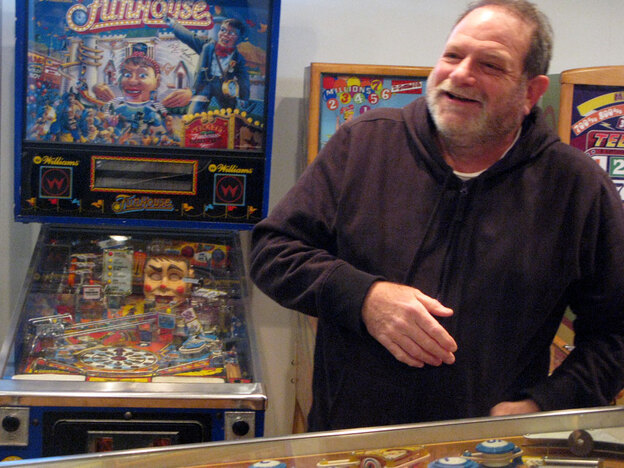 David Silverman with his pinball machine collection.