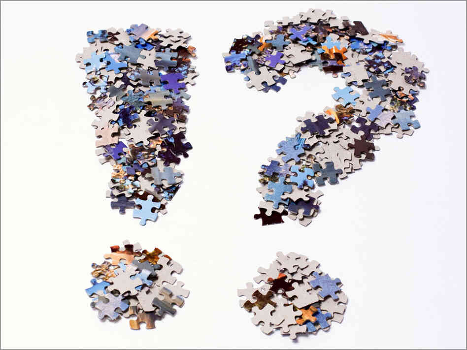 Exclaimation point and question mark made out of puzzle pieces Exclaimation point and question mark made out of puzzle pieces