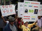 People participate in a rally against a proposed Islamic center and mosque in New York City. People participate in a rally against a proposed Islamic center and mosque in New York City.