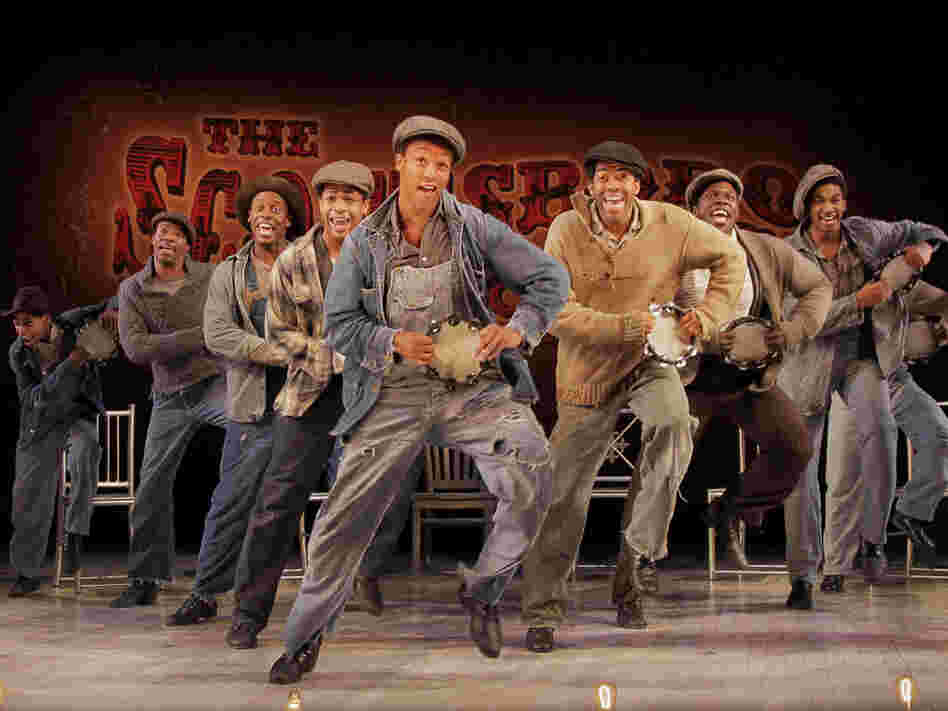 The company of 'The Scottsboro Boys' dancing on stage