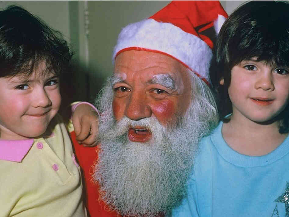 Tegan and Sara with Santa Claus