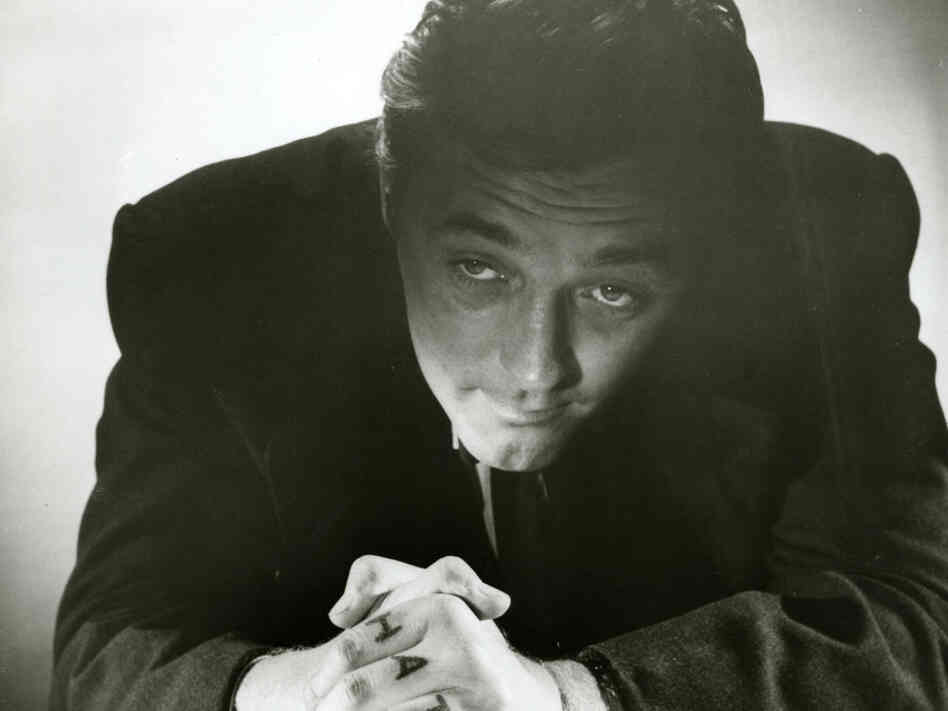 Robert Mitchell as Preacher Harry Powell in Night of the Hunter