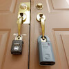 Locks on the doors of a foreclosed home