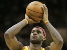 LeBron James with a basketball LeBron James with a basketball