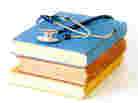 Stethoscope on a pile of books Stethoscope on a pile of books