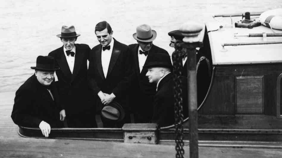 British Prime Minister Winston Churchill, with Harry Hopkins, John Winant and and William Bullitt. British Prime Minister Winston Churchill, with Harry Hopkins, John Winant and and William Bullitt.