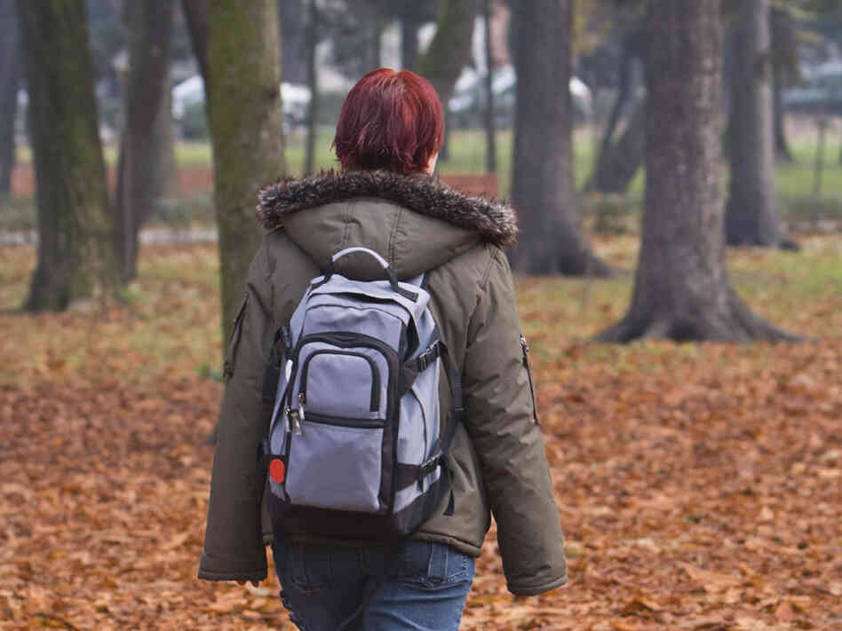 Teenage Girl walking in the woods Teenage Girl walking in the woods