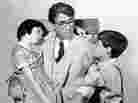 Gregory Peck, Mary Badham and Phillip Alford in 'To Kill A Mockingbird.' Gregory Peck, Mary Badham and Phillip Alford in 'To Kill A Mockingbird.'