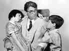Gregory Peck, Mary Badham and Phillip Alford in 'To Kill A Mockingbird.'