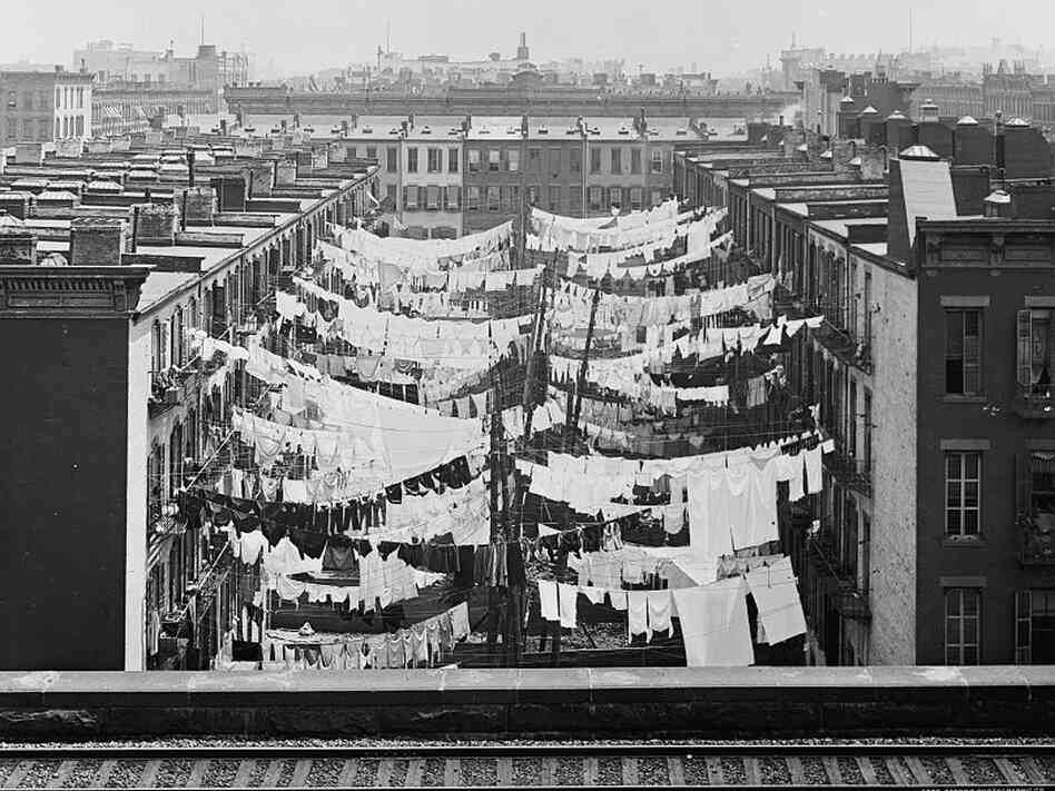 The yard of a tenement at Park Avene and 107th Street, circa 1900.