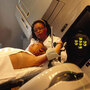 Woman Undergoing Radiation Therapy Woman Undergoing Radiation Therapy