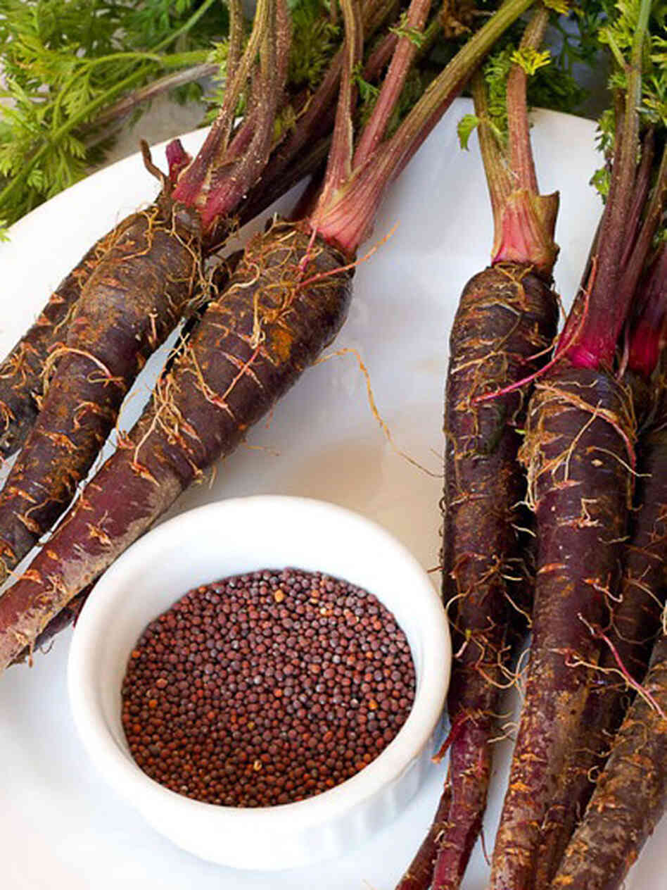 Black carrots and whole mustard seed, two main ingredients for making kanji. Black carrots and whole mustard seed, two main ingredients for making kanji.