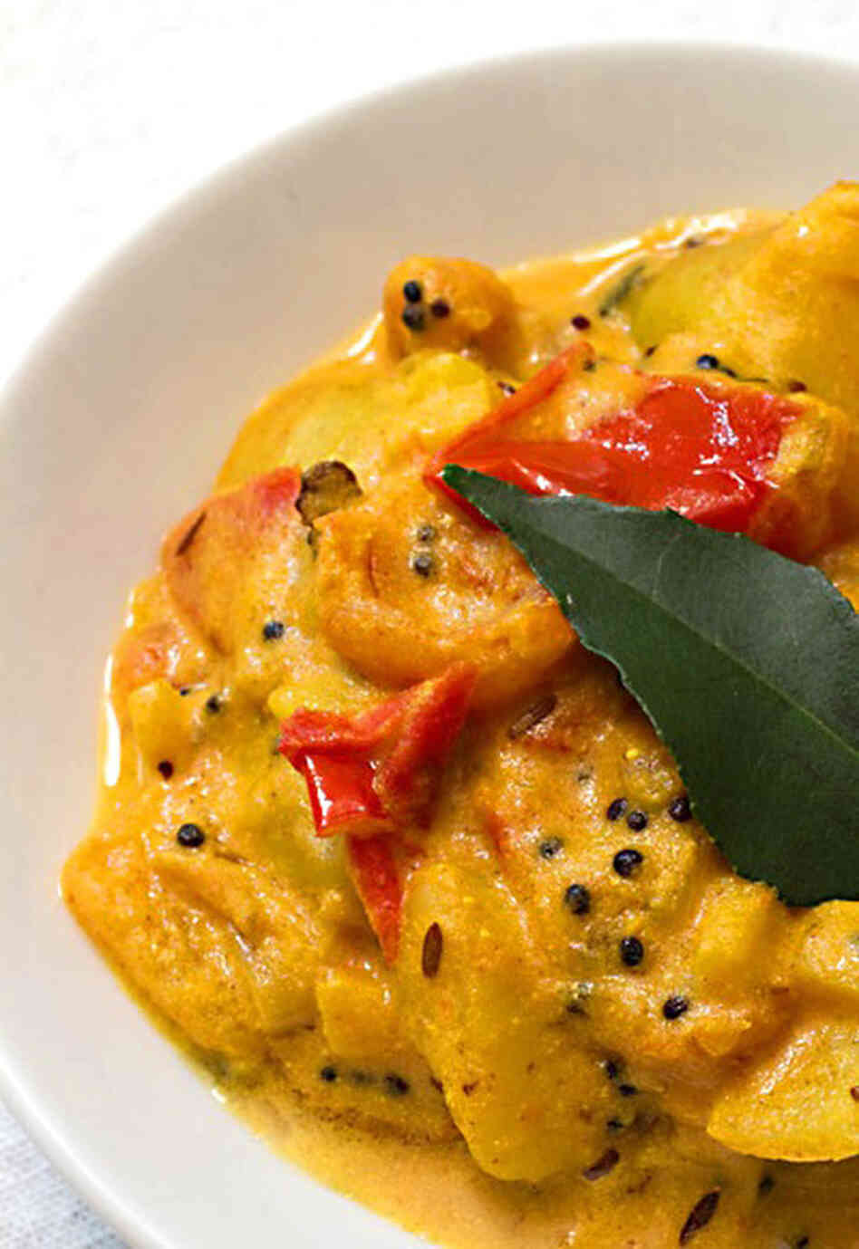 Dahi Aloo Curry, with potatoes, mustard seeds and cumin. Dahi Aloo Curry, with potatoes, mustard seeds and cumin.