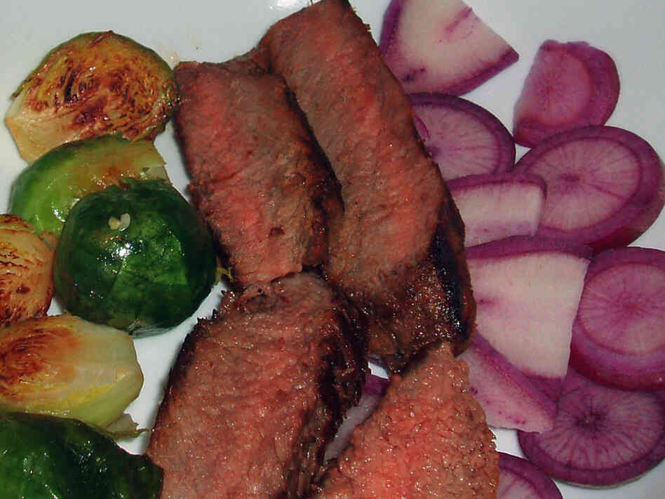 Sliced Steak On A Bed of Radishes Sliced Steak On A Bed of Radishes