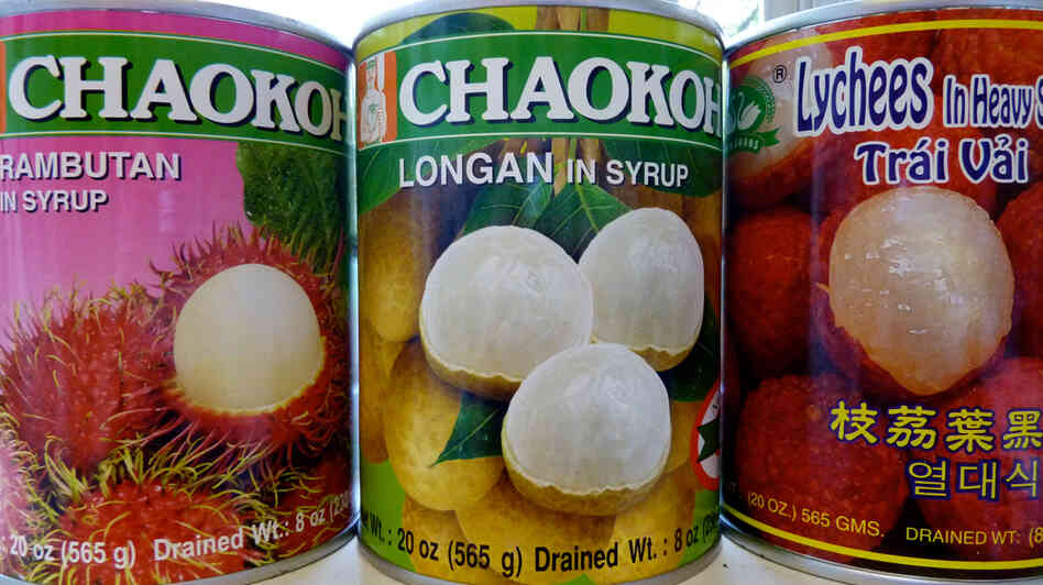 Cans of rambutan, longan and lychee fruits