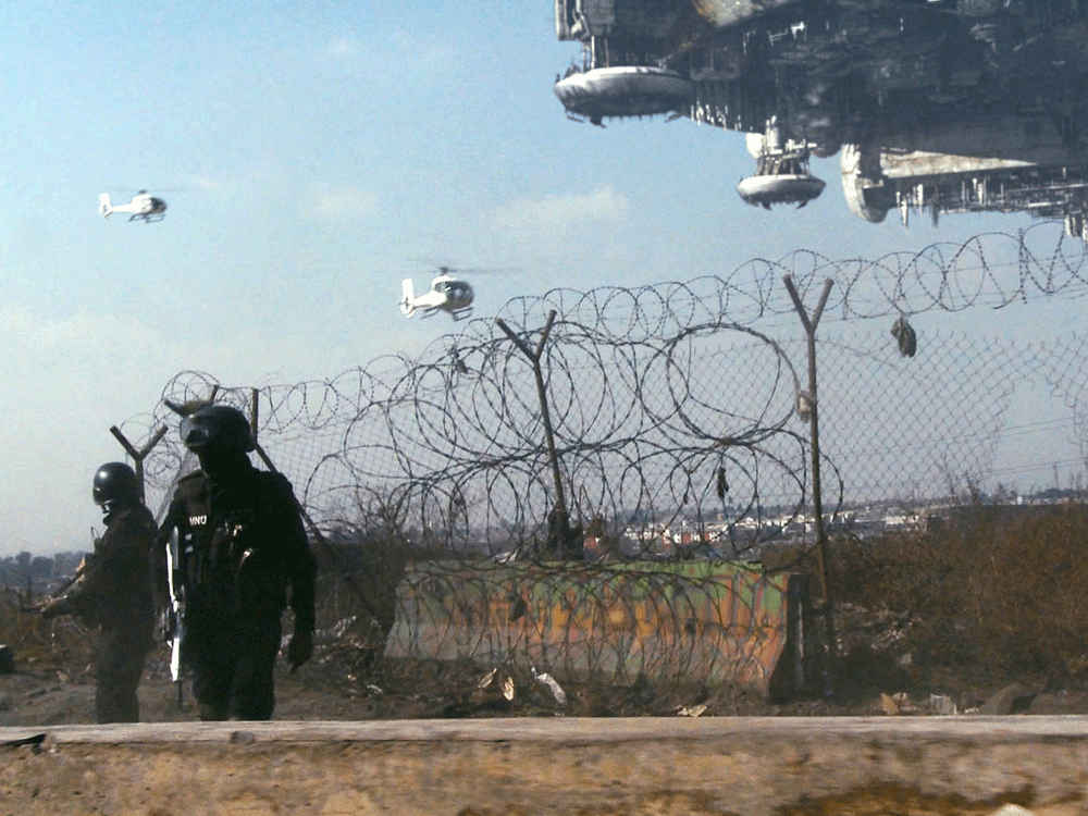 MNU officers patrol the border of District 9