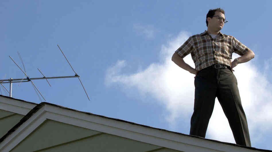 Larry Gopnik (Michael Stuhlbarg) stands on a roof Larry Gopnik (Michael Stuhlbarg) stands on a roof