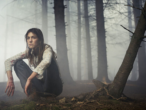 Charlotte Gainsbourg in a forest