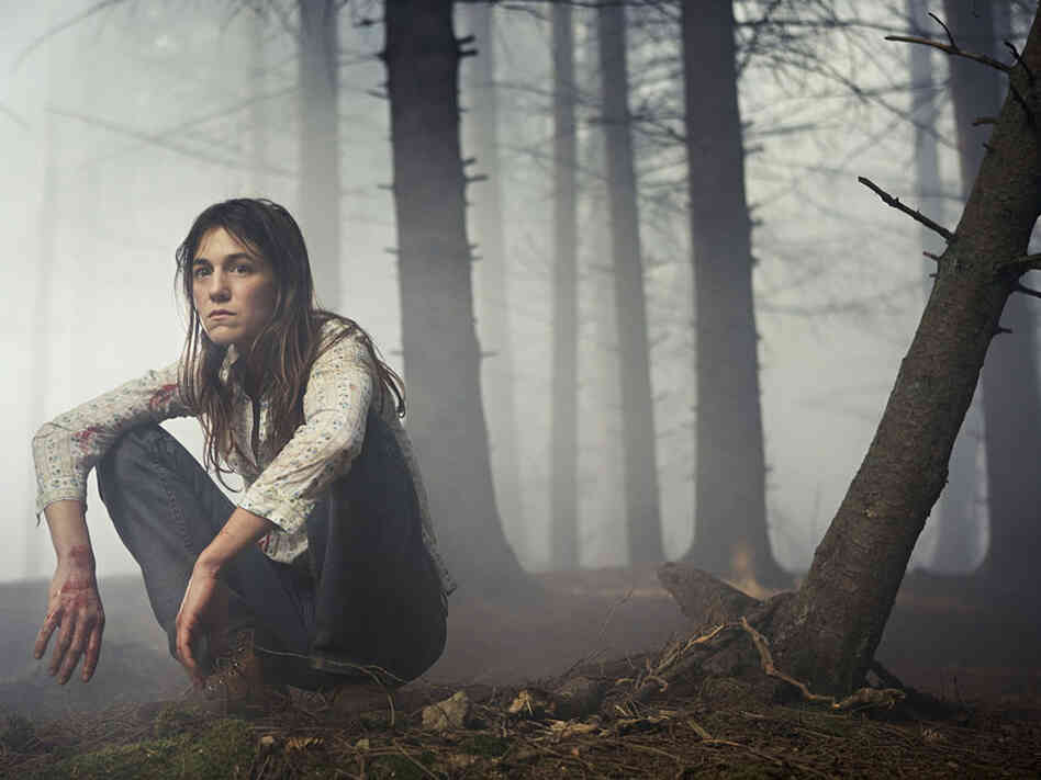 Charlotte Gainsbourg in a forest