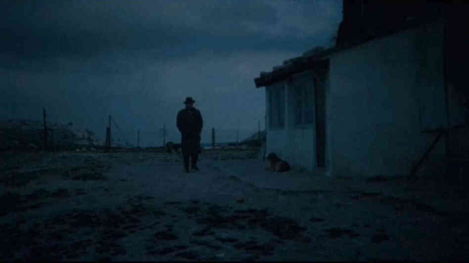 A man walks toward a house in 'Army of Shadows' A man walks toward a house in 'Army of Shadows'