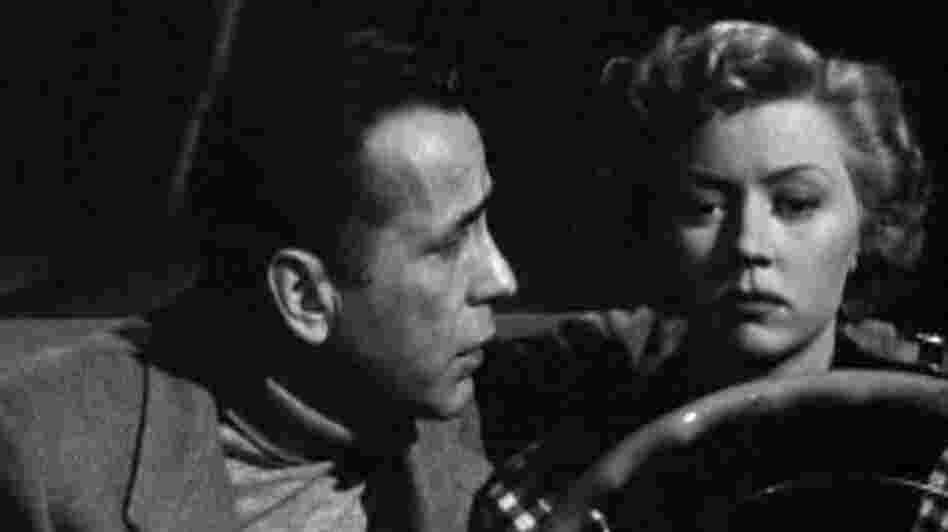 W: Humphrey Bogart (Dix) and Gloria Grahame (Laurel) in 'In A Lonely Place.' W: Humphrey Bogart (Dix) and Gloria Grahame (Laurel) in 'In A Lonely Place.'