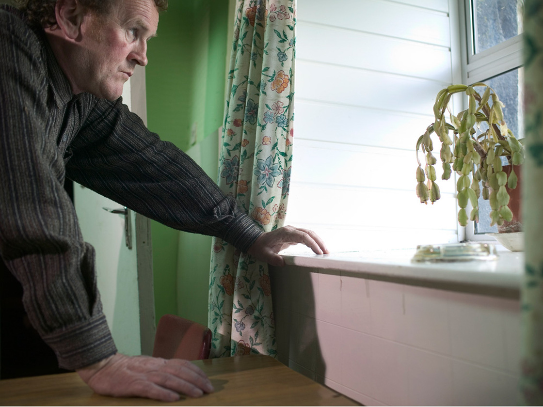 Colm Meaney at window