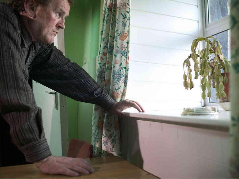 Colm Meaney at window