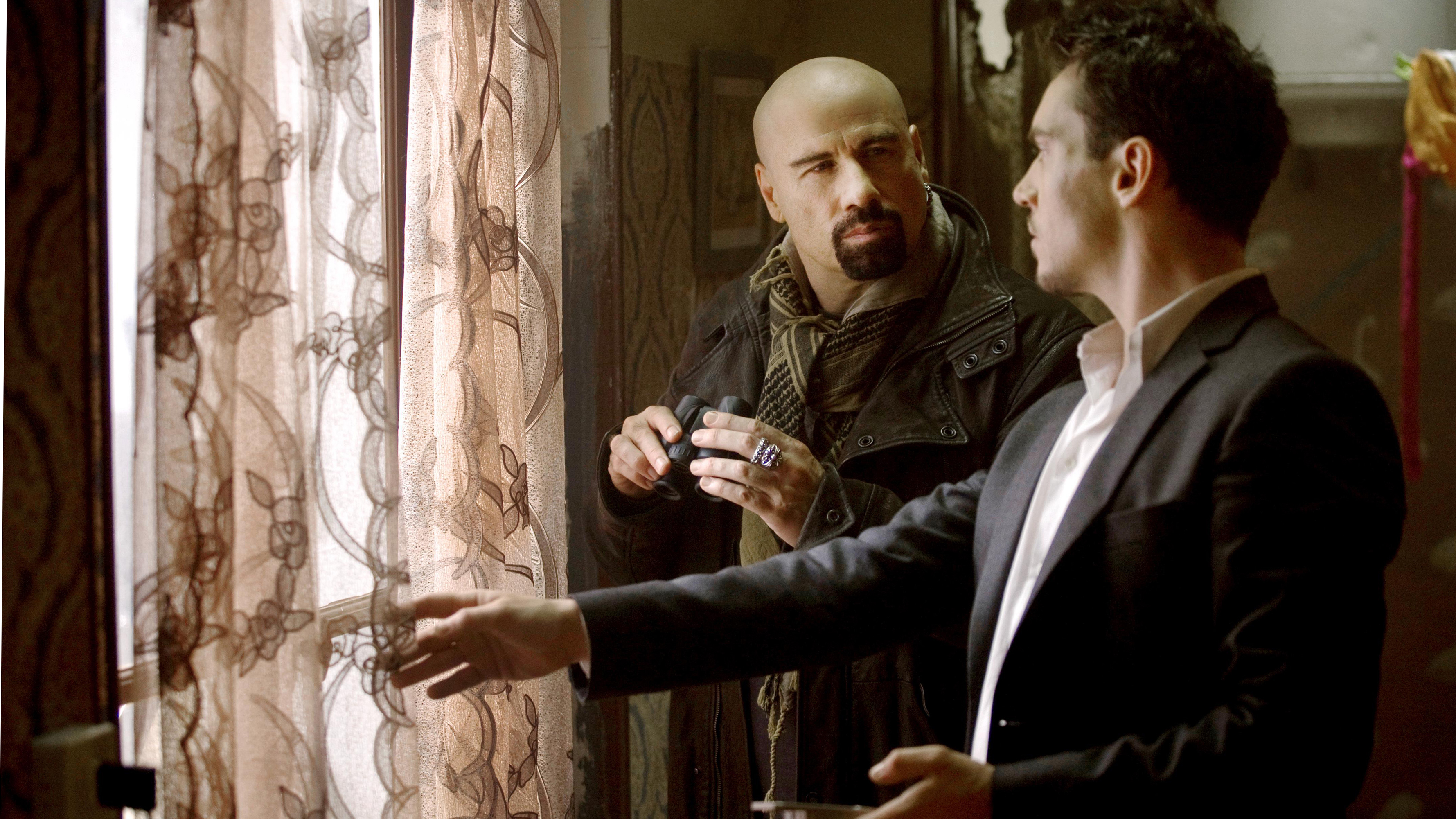 John Travolta stars as an FBI agent trying to stop terrorists in the thriller <em>From Paris with Love.</em>