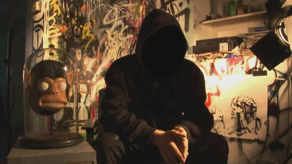 Banksy conducting an interview in his studio Banksy conducting an interview in his studio
