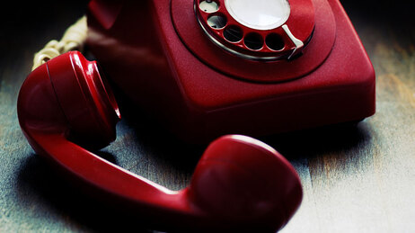 Red phone left of the hook.
