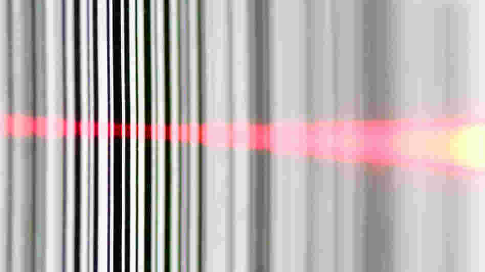 A barcode read by a laser. A barcode read by a laser.