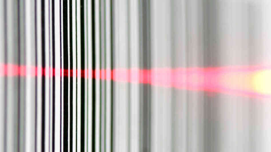 A barcode read by a laser. A barcode read by a laser.