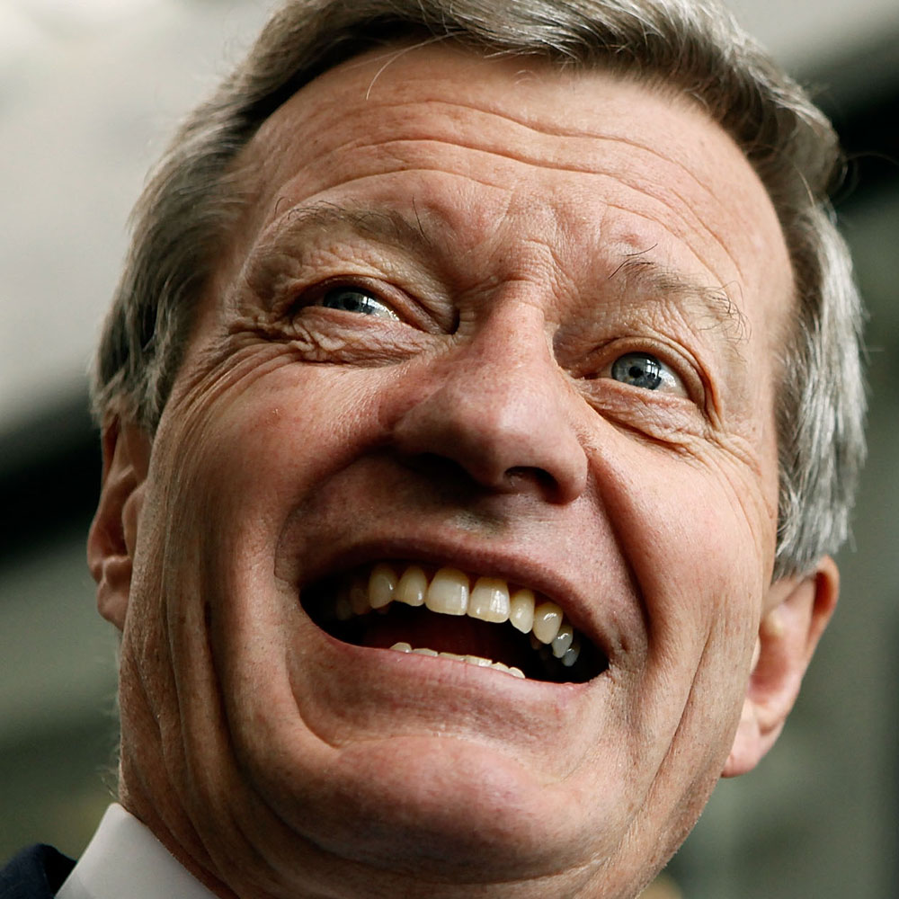 senator baucus smiles.