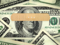bandage on a $100 bill