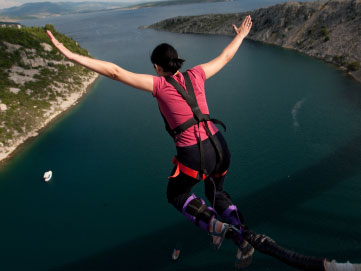 bungee jumper takes a leap.