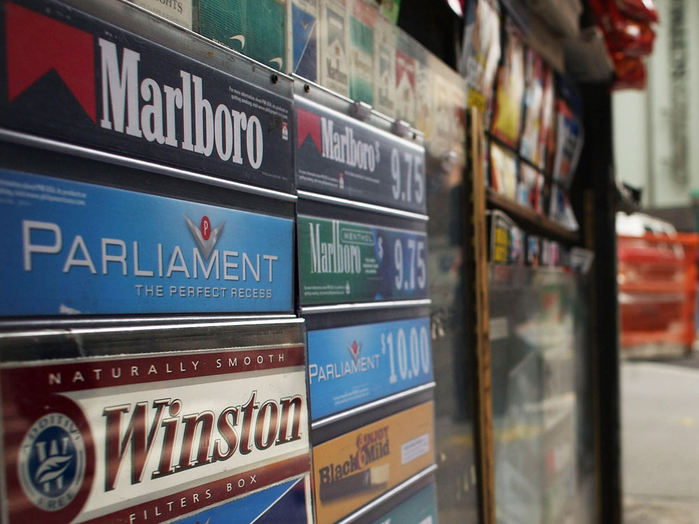 cigarette logos and packs at a new york newsstand