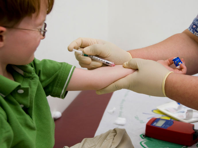 Young boy gets vaccinated