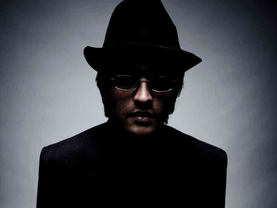 Man wearing a dark hat.