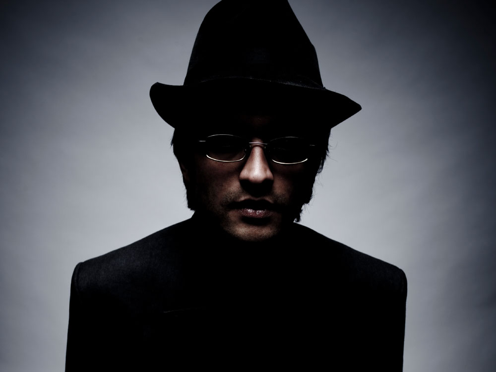 Man wearing a dark hat. 