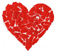 A heart assembled from pieces of red paper.