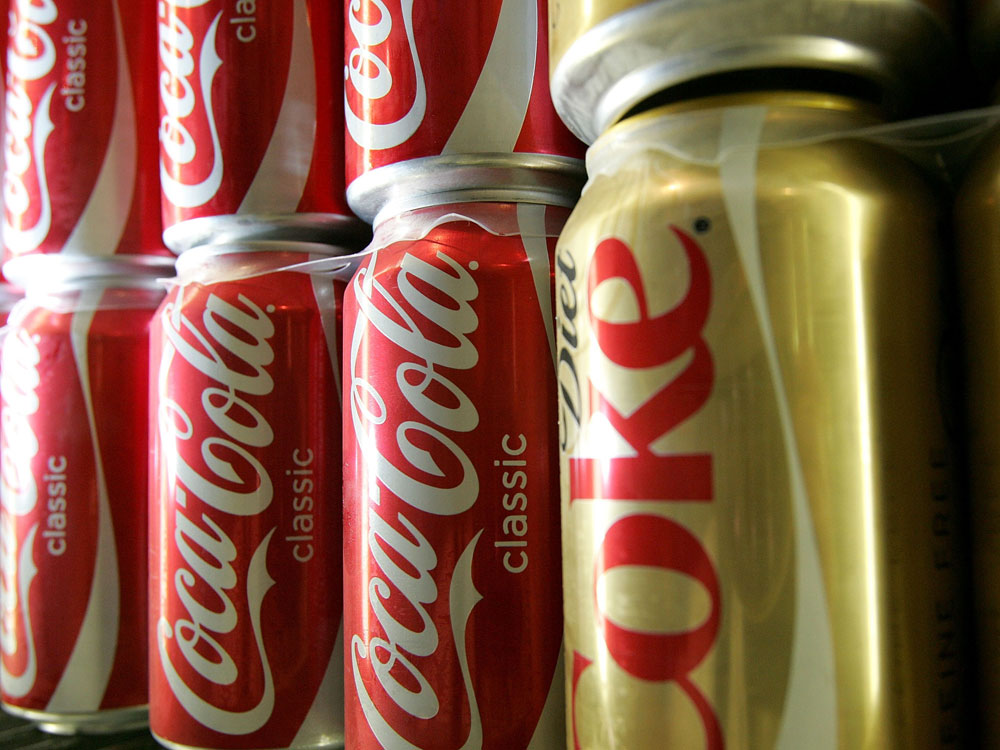 Cans of Coca-Cola.