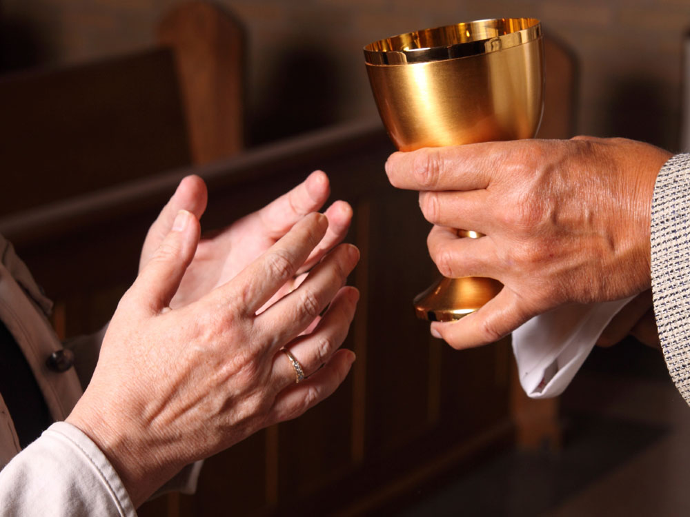 A communal chalice of wine during Communion.