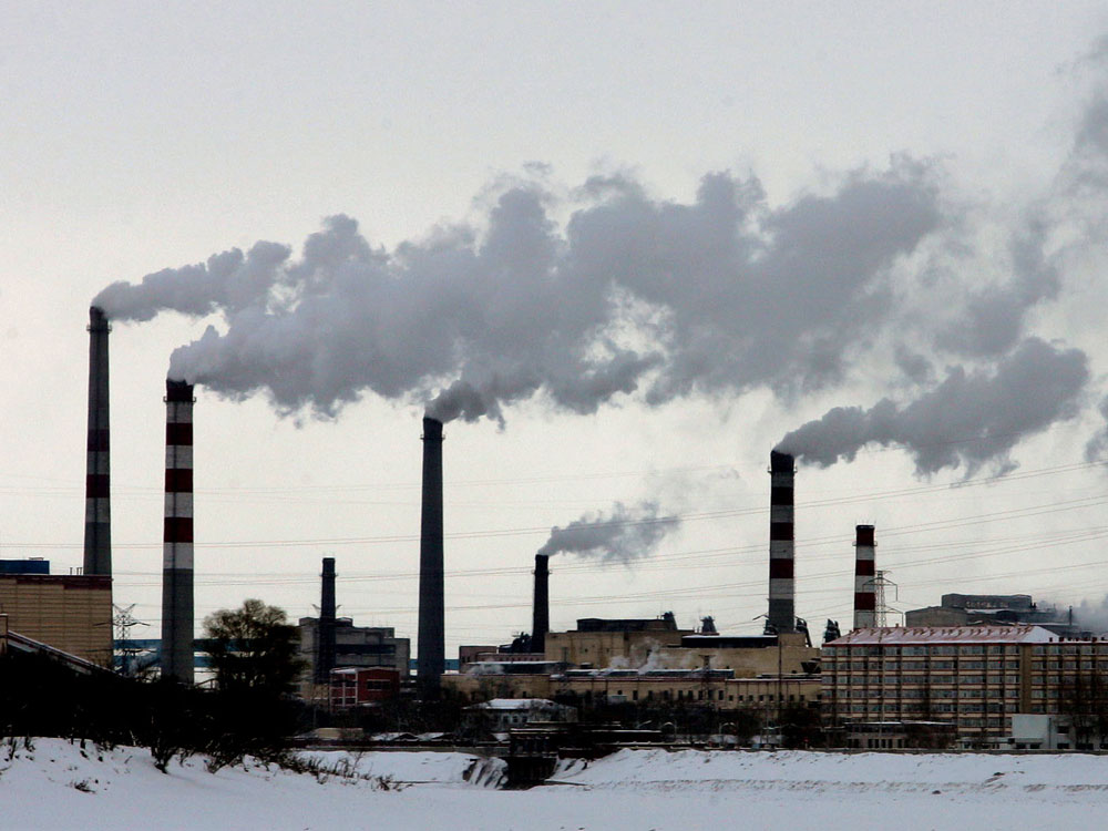 Chinese smokestacks in winter.