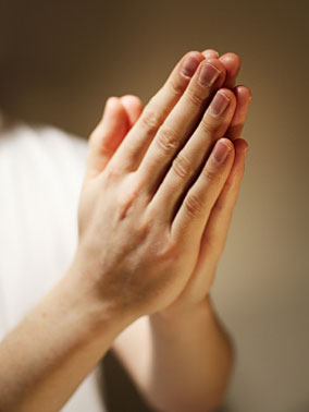 Hands in prayer.