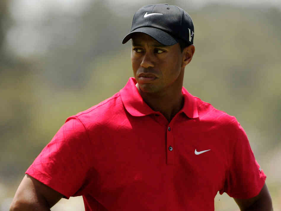 Tiger Woods swinging a golf club.